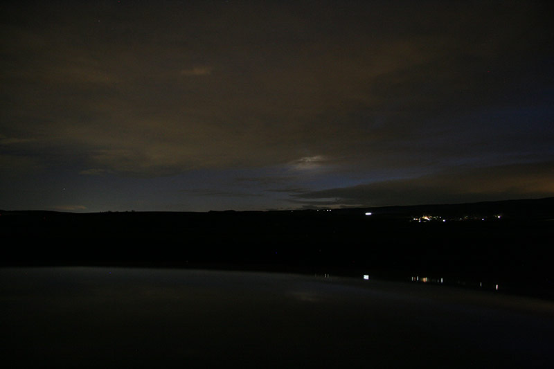 Moon and Venus behind dense clouds