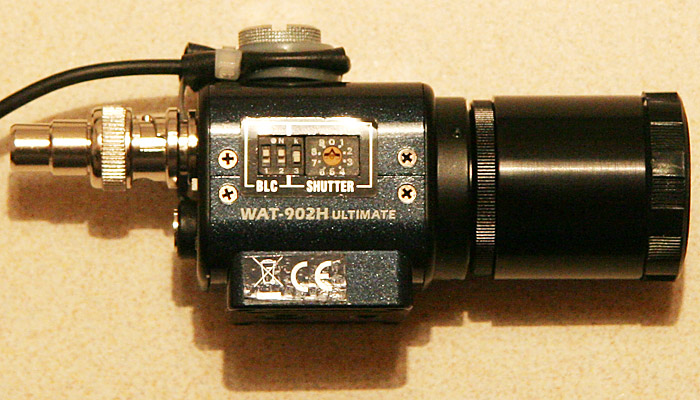 Cable mounting with a photo screw on the top of the case