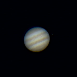 Jupiter mit Mond Io am 16. März 2004